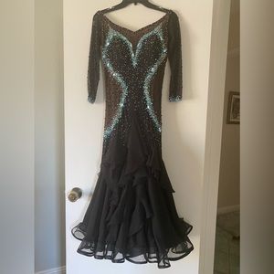 Lovely ballroom dress, slightly worn, with beautiful crystals and stones.